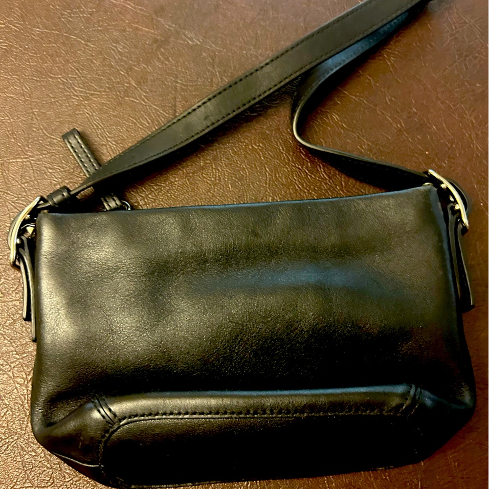 All leather genuine Coach purse. Lightly used , great shape inside and out!!